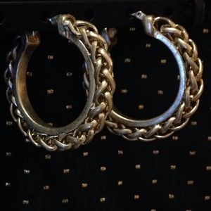 Gold plated chain trimmed pierced loop earrings.